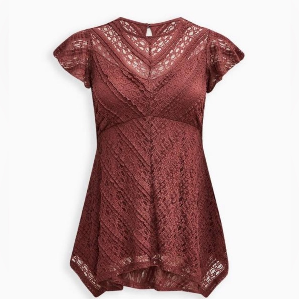 Torrid babydoll lace crew neck sharkbite hem top. New with tags size 4x